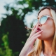 Woman smoking marijuana lifestyle brands